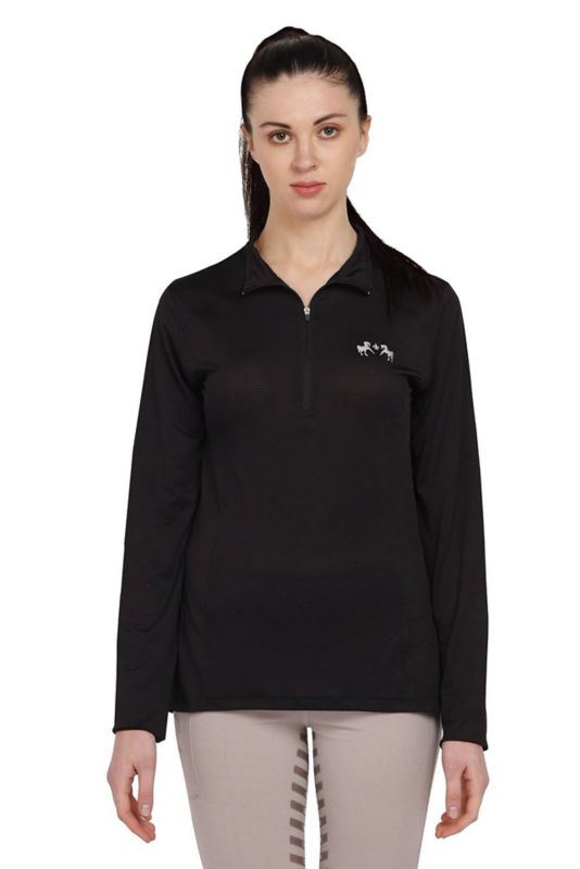 Woman wearing black Tuffrider long-sleeve zip-up athletic shirt.