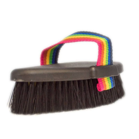 Tuffrider horse grooming brush with rainbow strap on white background.