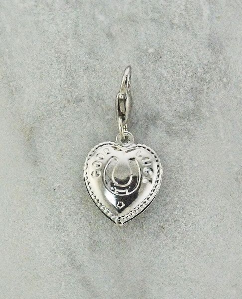 Silver heart-shaped pendant with horse shoe, horse themed jewelry.